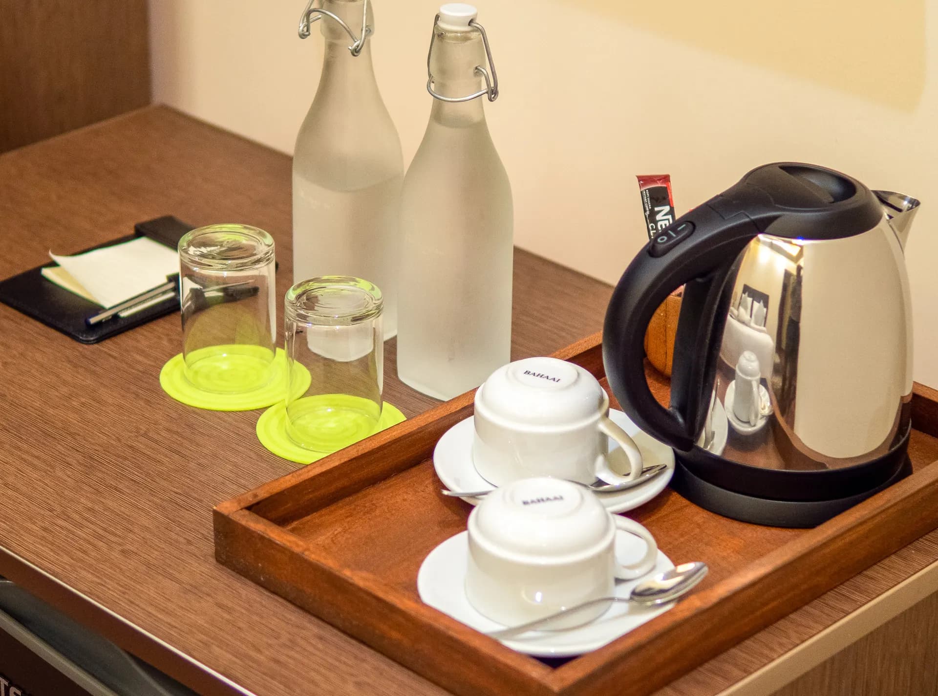 Kettle, cups and water bottles in the room
