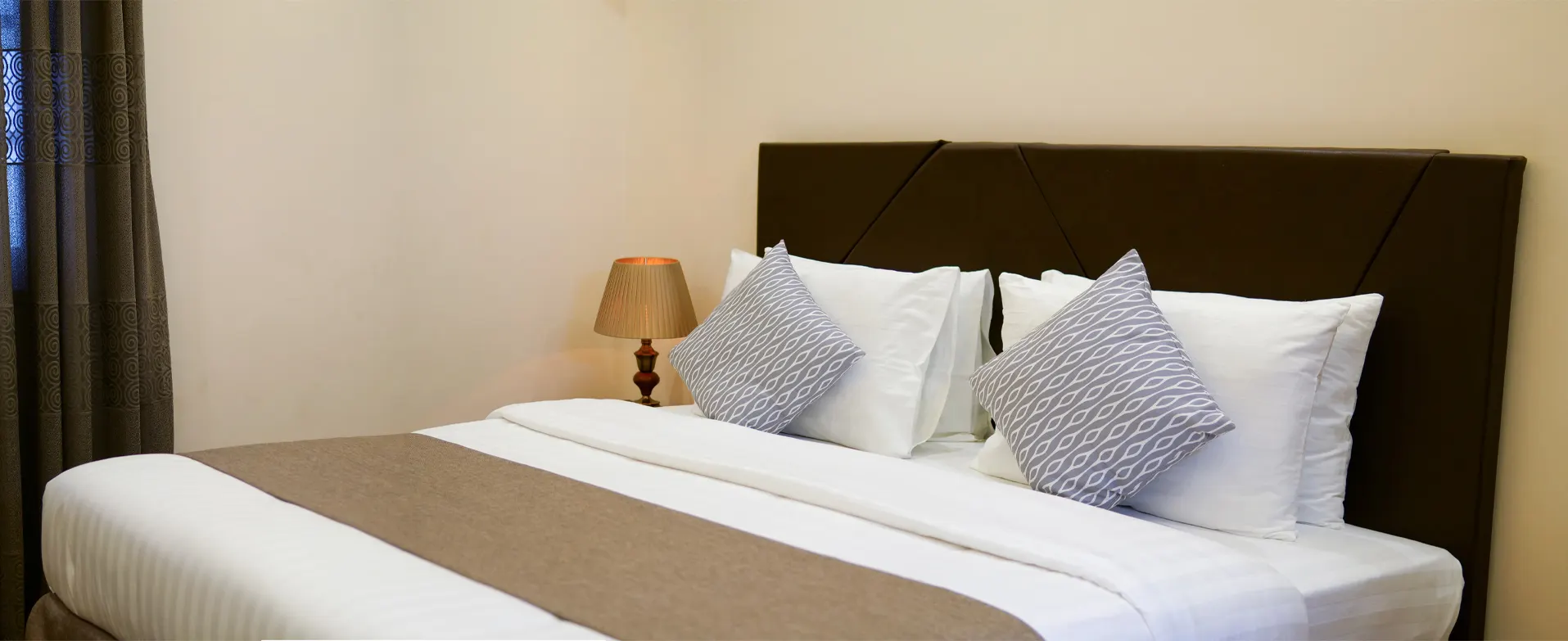 Pillows on a freshly made bed