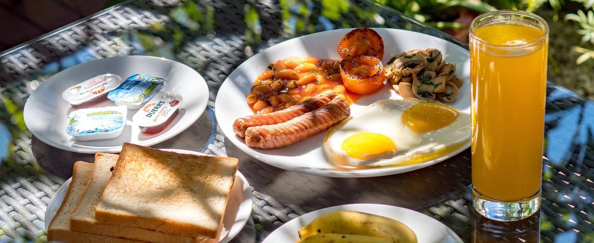 Breakfast with eggs, sausages and toast