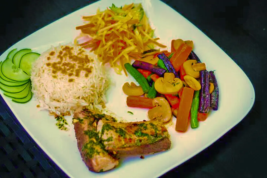Grilled fish with rice and vegetables